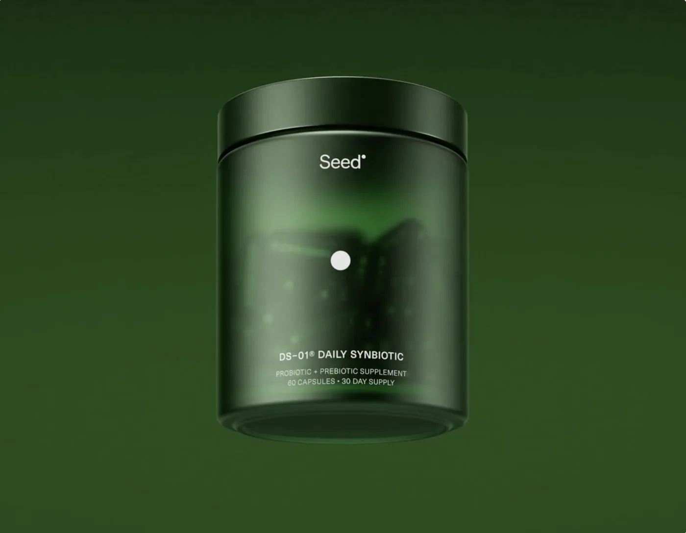 Seed reference photo: DS-01 Daily Synbiotic jar on a deep green background